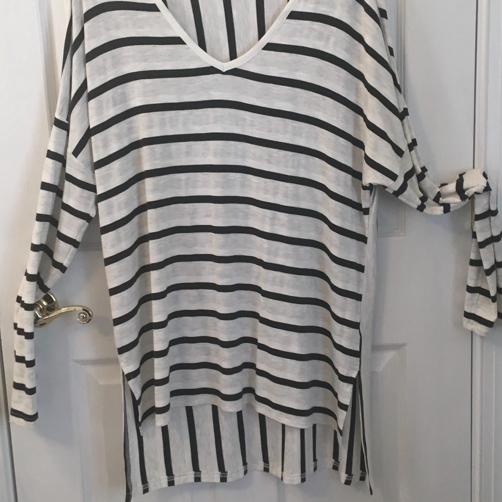 Strazzi brand.  Black and cream strips.  High Low.  Fun oversized top.